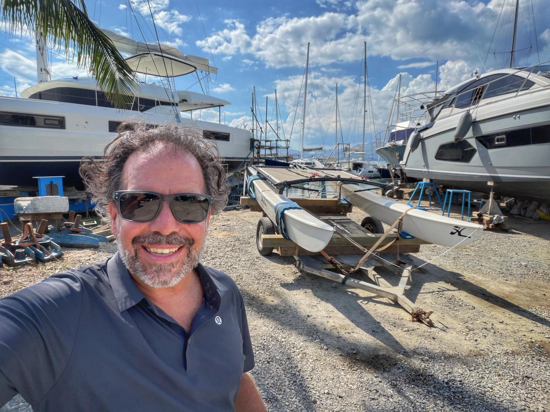 Adrian at the boatyard — Hobie 16 on the trailer, ready for launch.